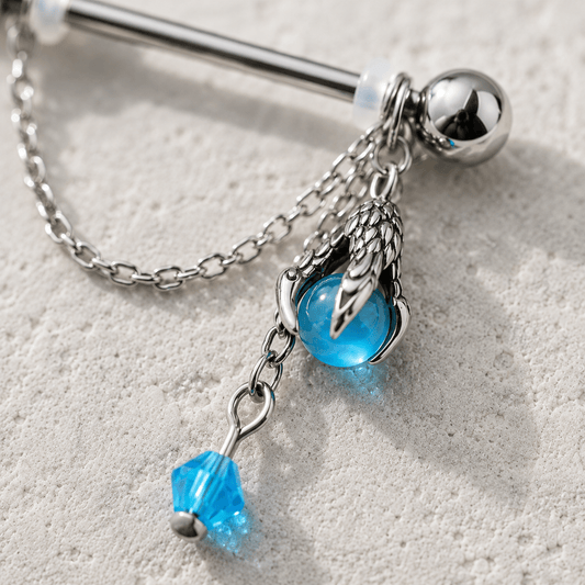 Dragon claw and aqua orb body jewelry detail