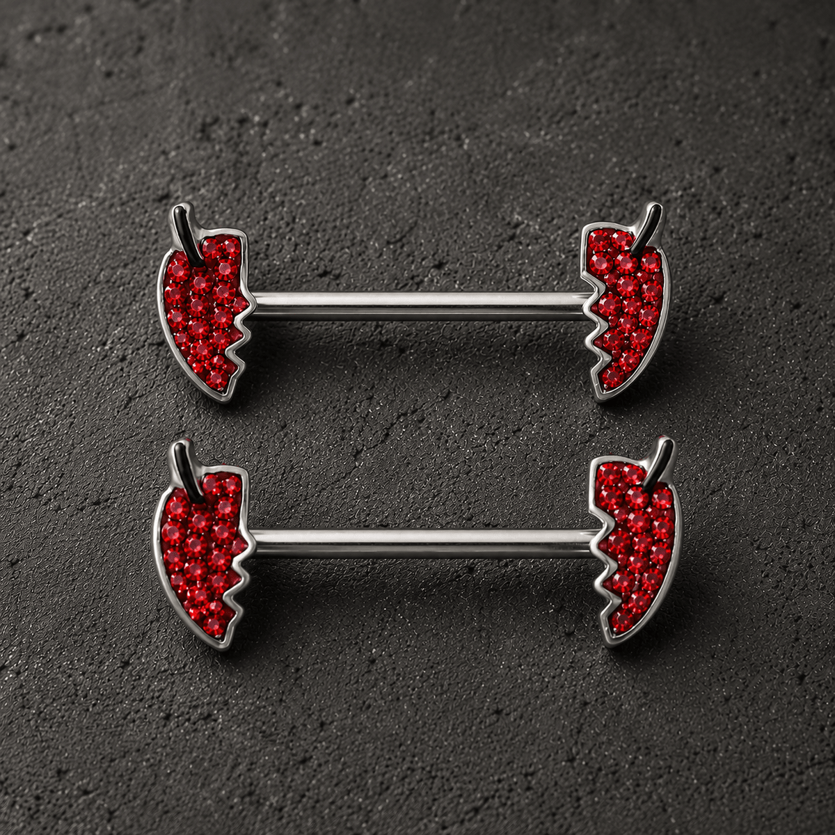Jeweled devil's heart body jewelry pair detail