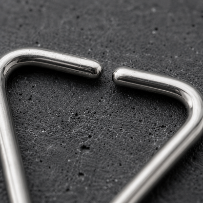 Close up of triangle shaped seamless ring design, 316L stainless steel detail close up
