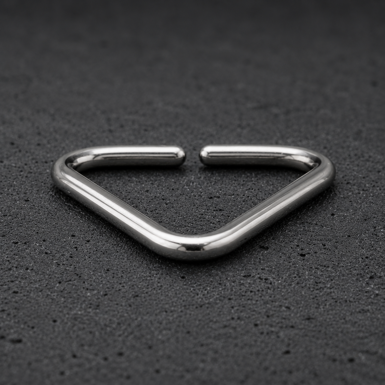 Side view of triangle cartilage earring, 16G seamless 316L stainless steel 10mm diameter
