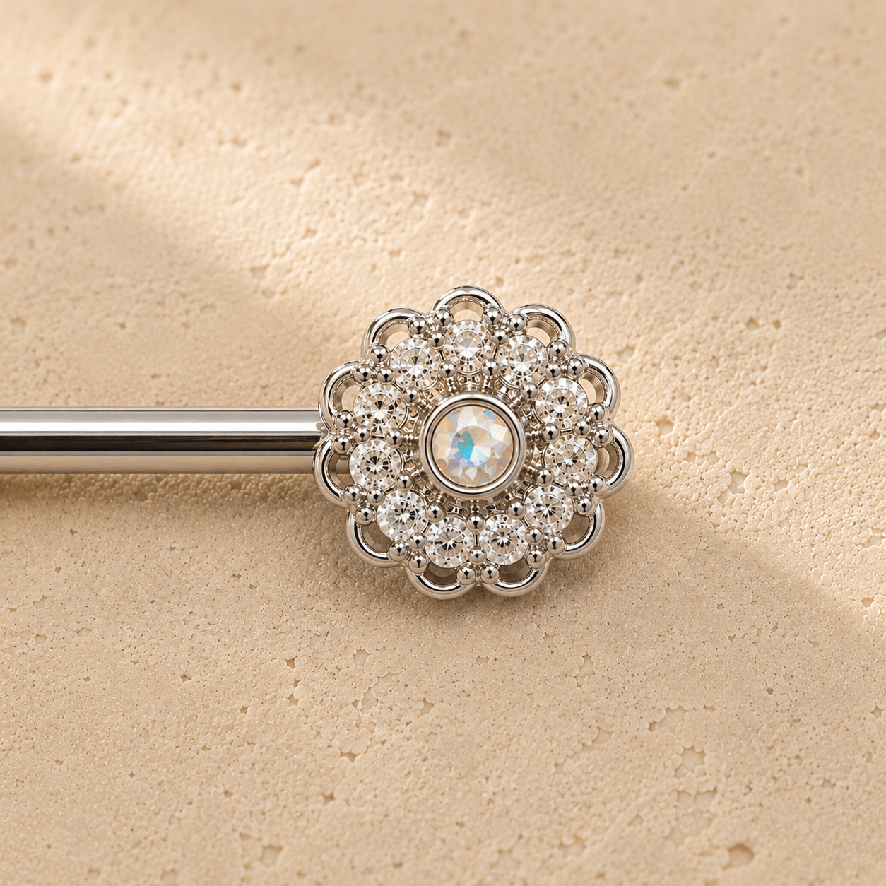 Close up of cluster texture flower and aurora borealis CZ center on nipple bar detail