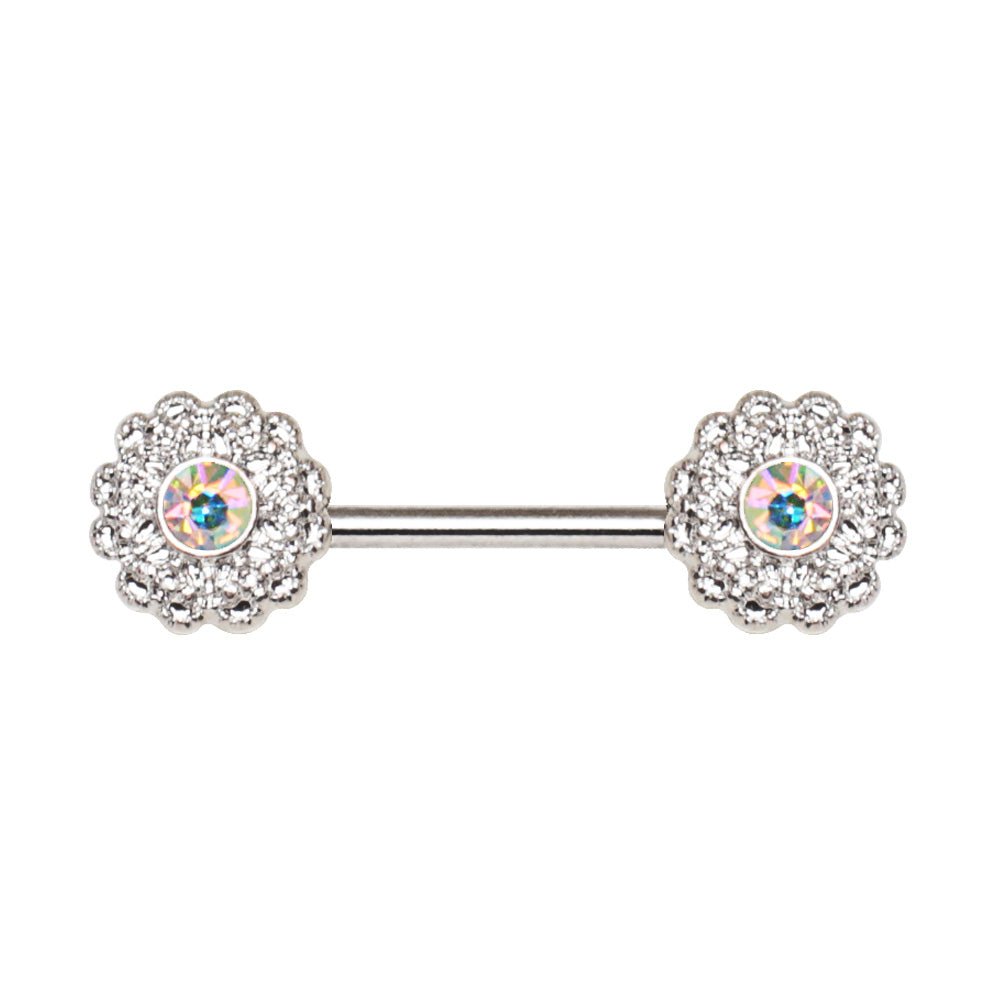Styled flat lay of aurora flower cluster nipple bar pair, textured iridescent floral body jewelry