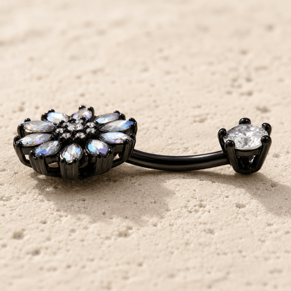 Black PVD Plated Aurora Borealis Flower on a beige surface