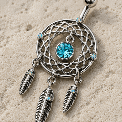Close up of aqua CZ dream catcher design and dangling feathers, aurora sparkle detail