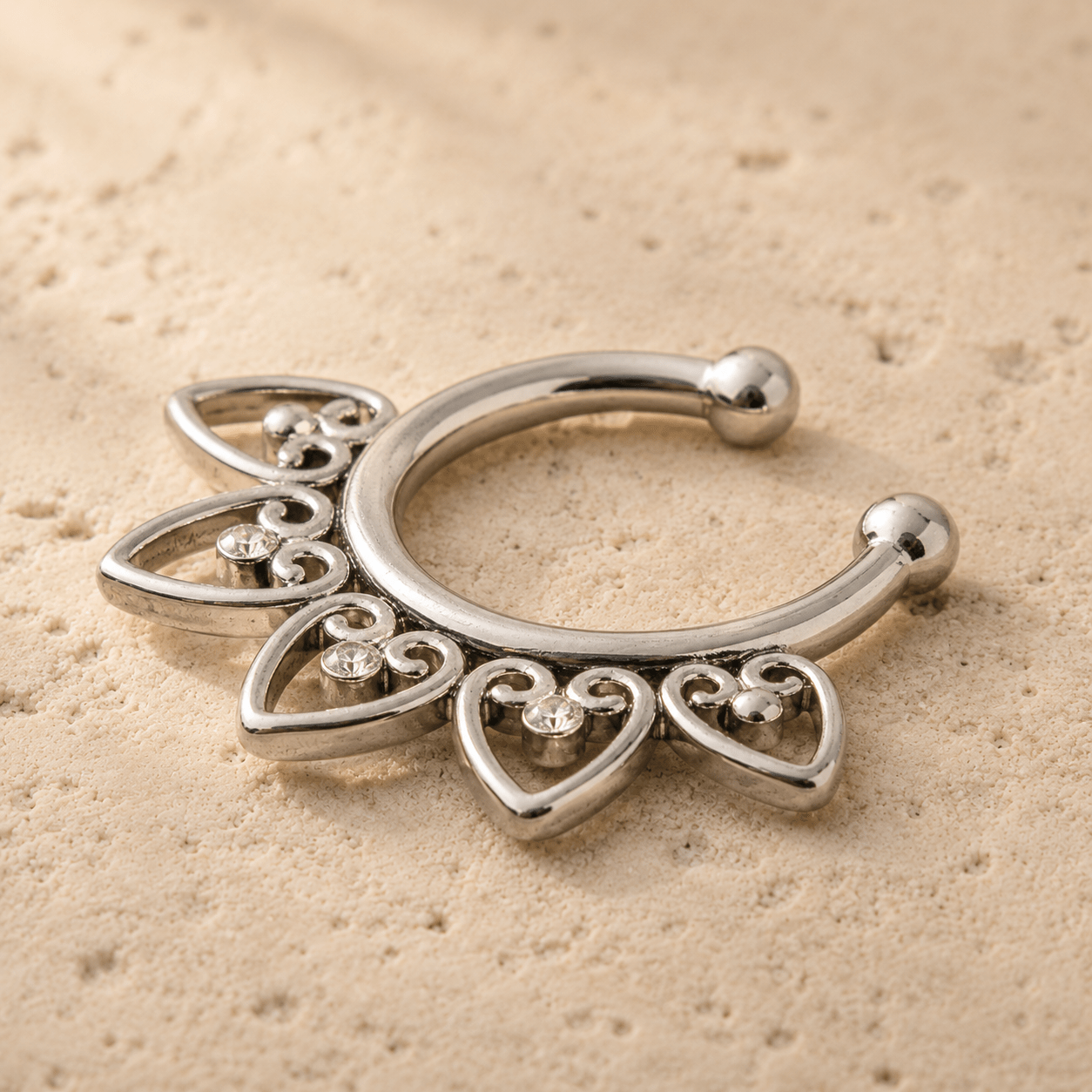 Side view of clip-on fake septum ring, curved barbell shape, no piercing needed, 10mm stainless steel nose ring