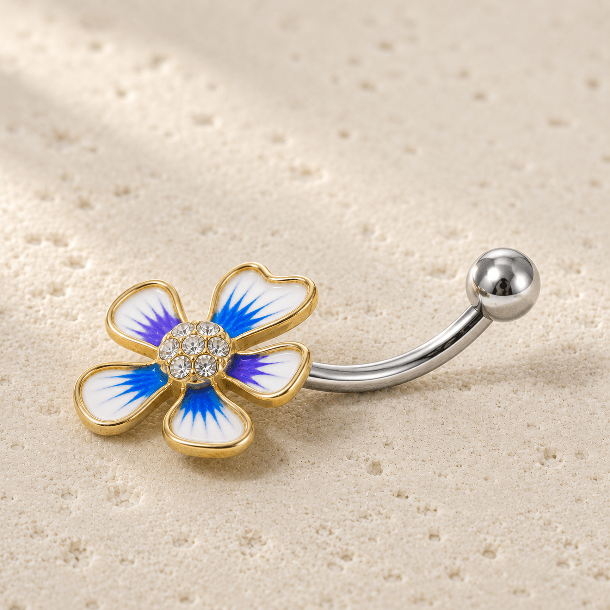 Side view of gold plated hibiscus flower navel ring, 14G 316L stainless steel, 18 x 20mm flower design