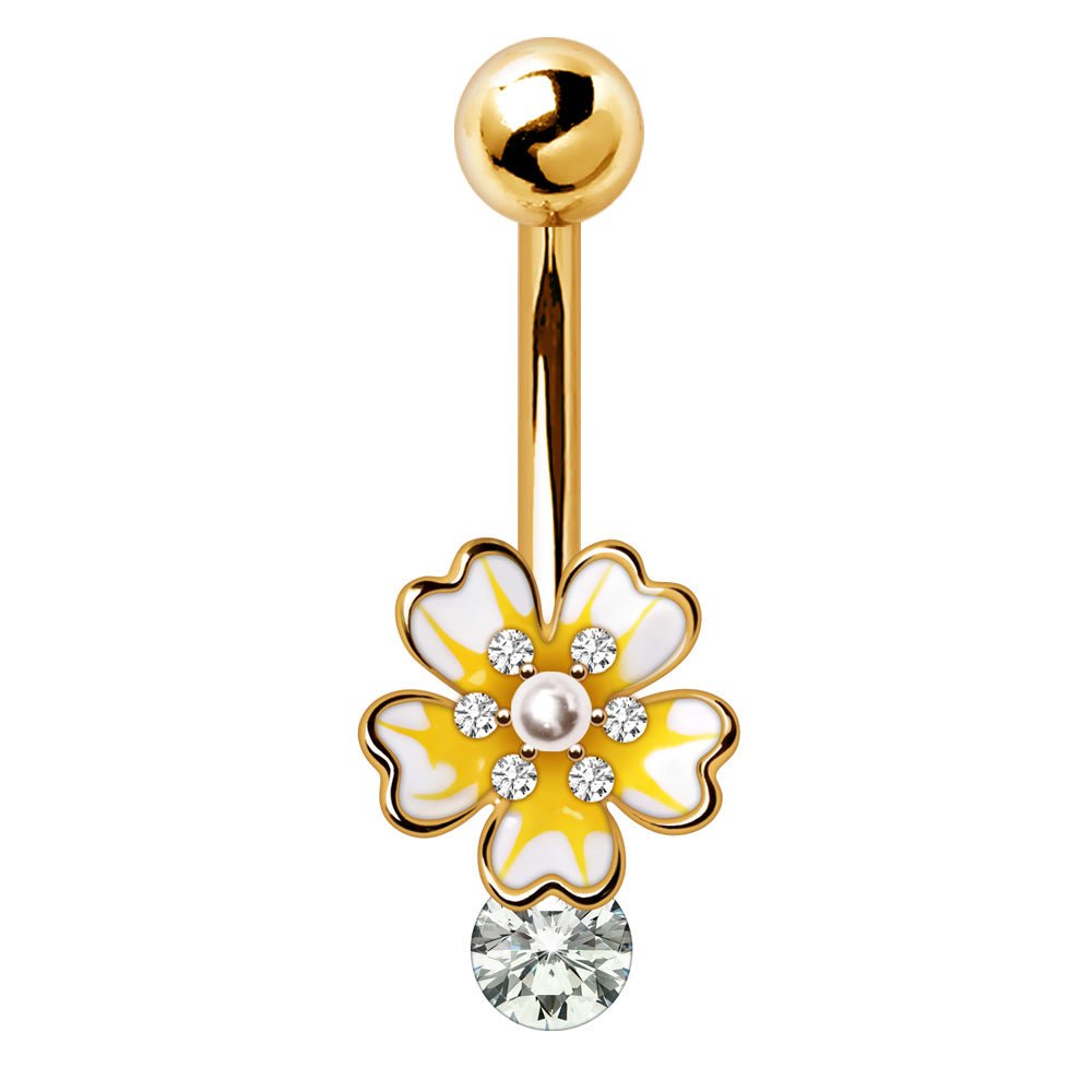 A gold-plated belly button ring featuring a white and yellow flower charm with small clear rhinestones, a pearl-like center, and a dangling clear faceted gemstone, shown on a solid white background.