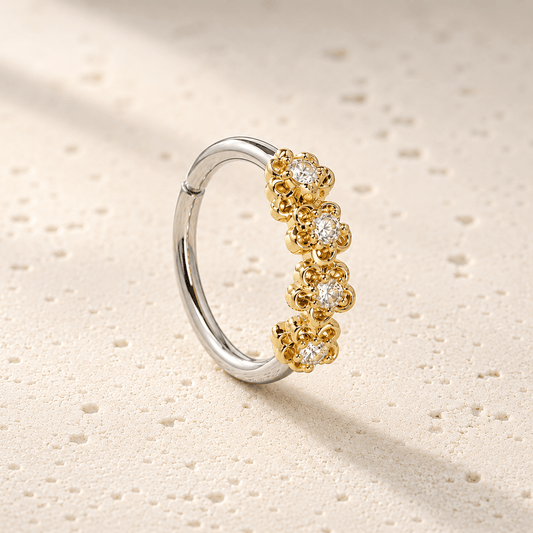 Side view of golden flowers seamless circular ring, 16G gold plated 316L steel 10mm diameter