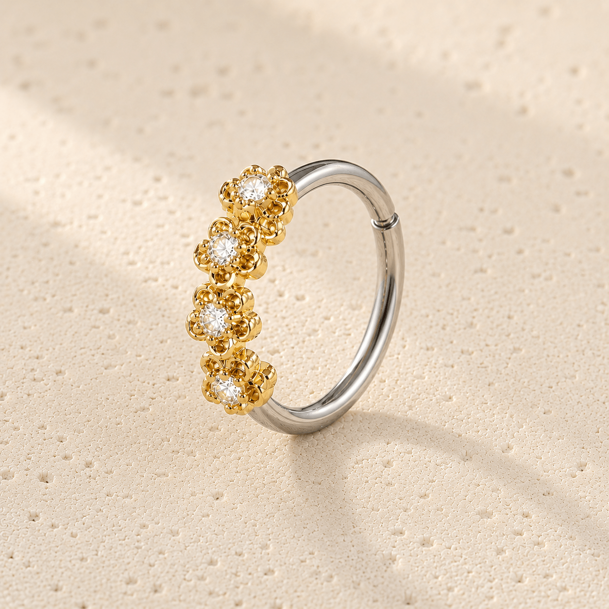 Golden flowers seamless circular ring 16G, four gold flowers prong set CZ 316L stainless steel