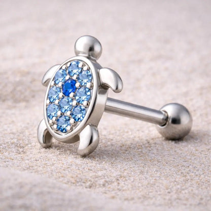 Side view of ocean blue turtle cartilage earring, 16G 316L stainless steel 7x8mm turtle size