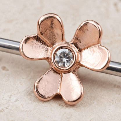 Close up of rose gold plated clover leaf with clear CZ gems on nipple bar, gold plated zinc alloy detail