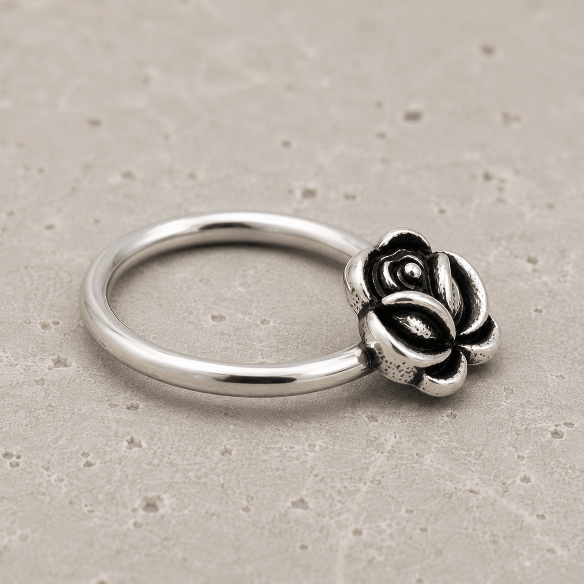 Stainless Steel Captive Bead Ring with Antique Plated Flower - Skin Metals
