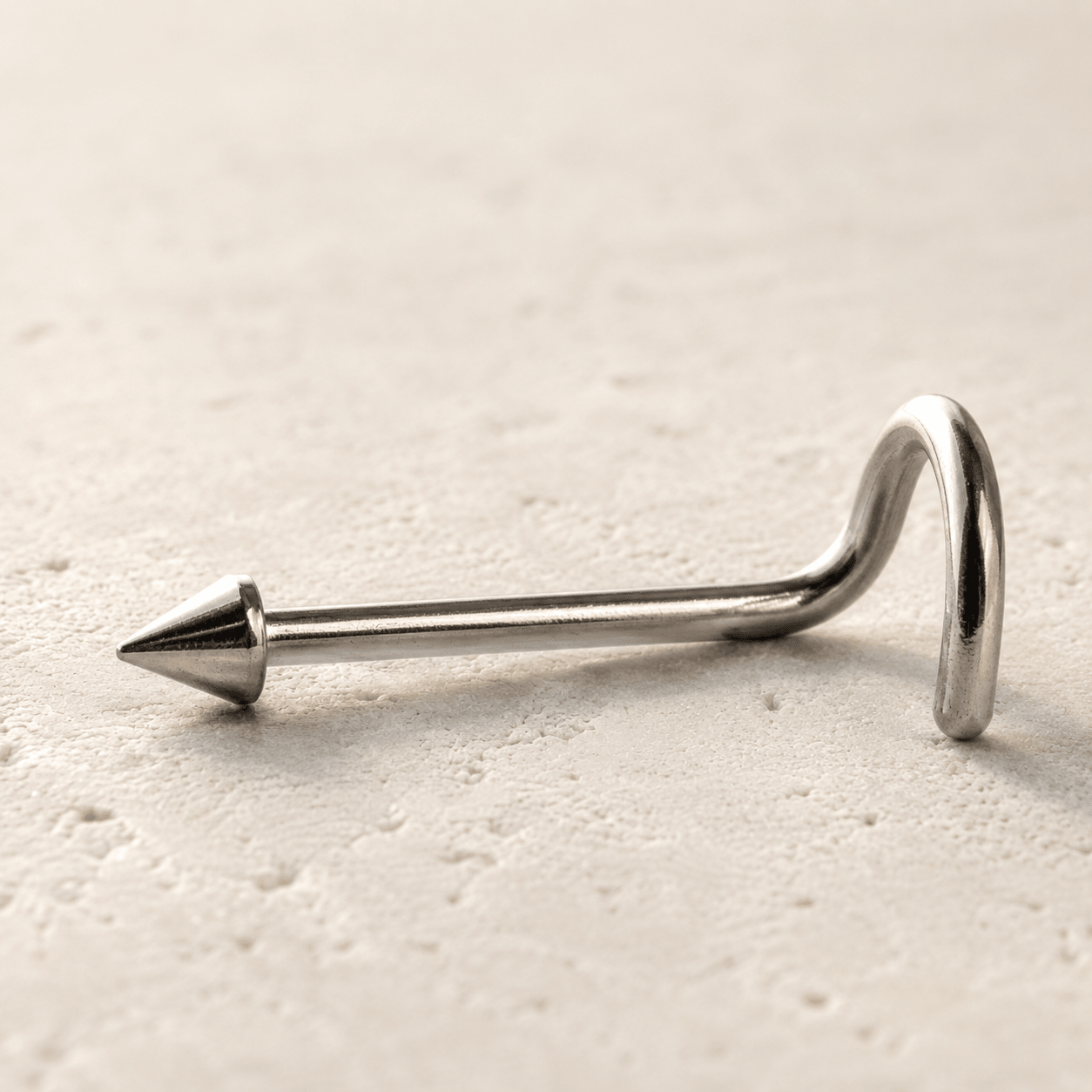 Side view of 316L stainless steel screw nose ring, 18G 20G, ball dome spike top options