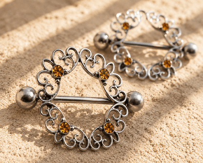 Topaz CZ ornate nipple shield pair on white background, 14G four topaz CZ 316L stainless steel body jewelry