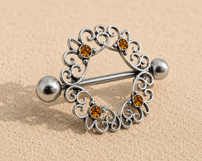 Side view of topaz CZ ornate nipple shield, 14G externally threaded 316L stainless steel, 14mm wearable size