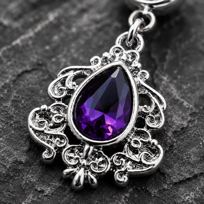Close up of large purple teardrop CZ on ornate Victorian dangle navel ring, clear CZ bottom ball detail
